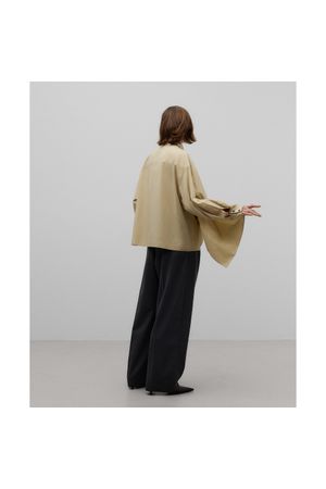 Blusa pieza asimétrica mujer